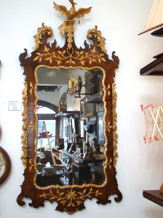 An attractive George II period Walnut and Parcel-gilt mirror circa 1750